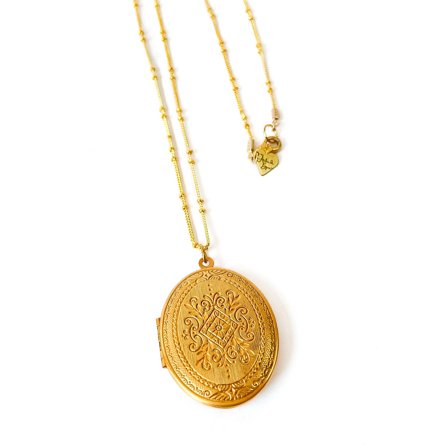 Collar con Relicario Dorado Antiguo de Miriam Haskell