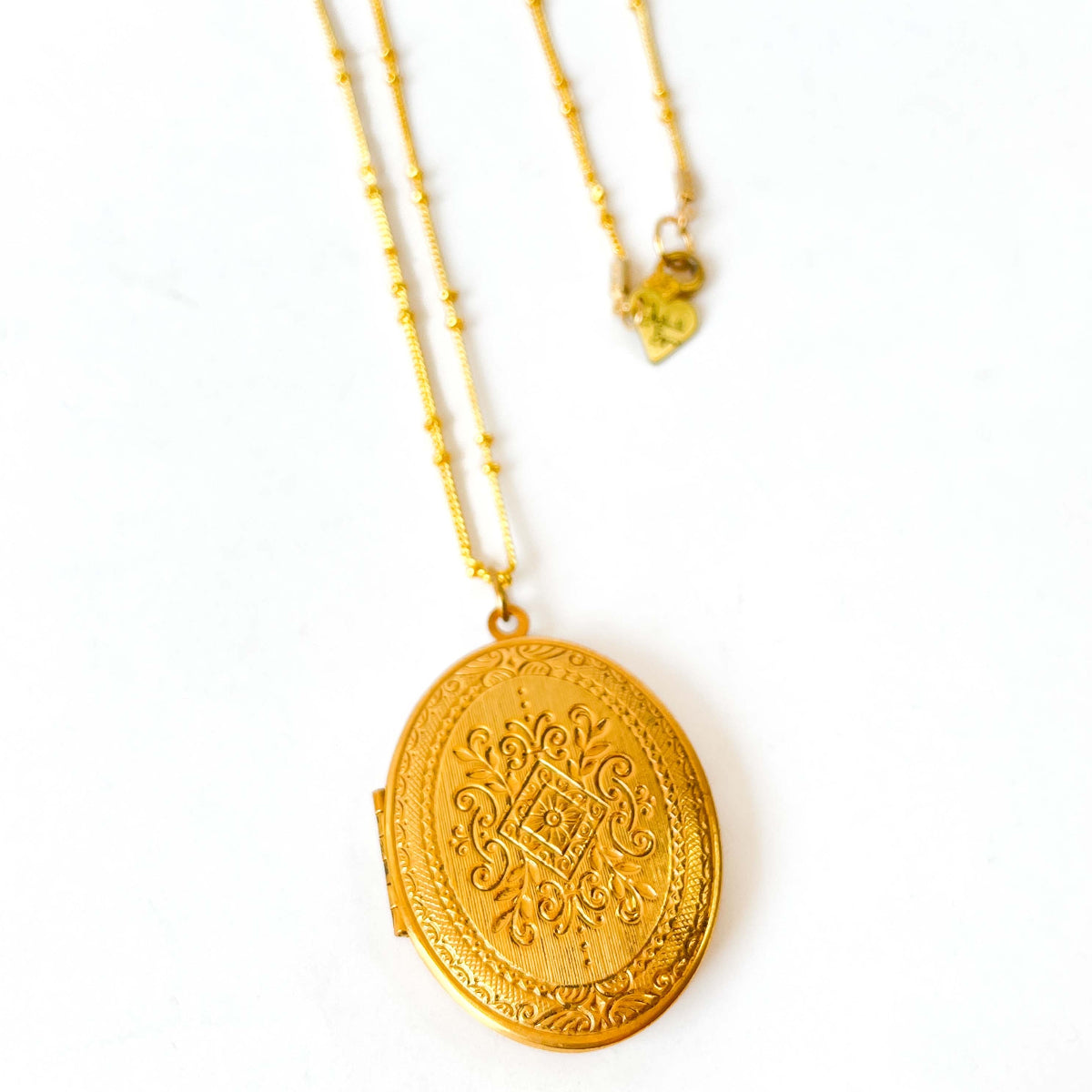 relicario Miriam Haskell

relicario dorado vintage