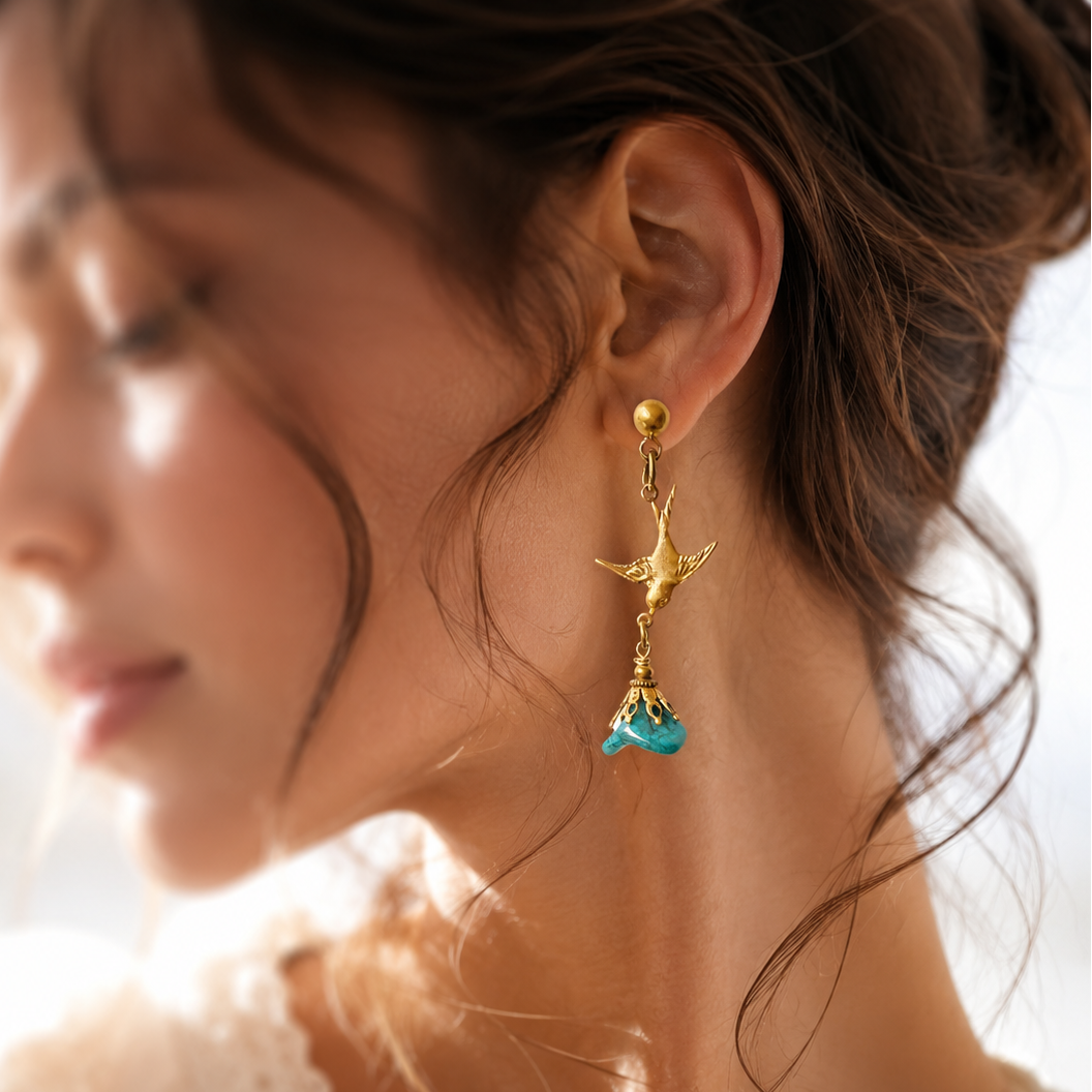 aros colgantes de golondrina y flor turquesa