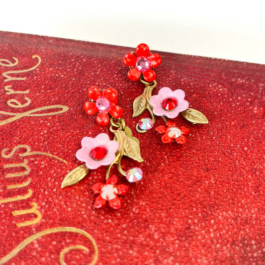 aros flores en rojo y rosado con ramita dorada