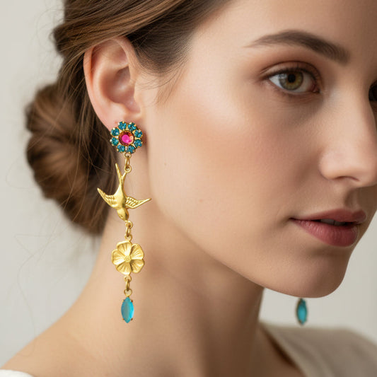 aros golondrina mujer
pendientes largos dorados vintage