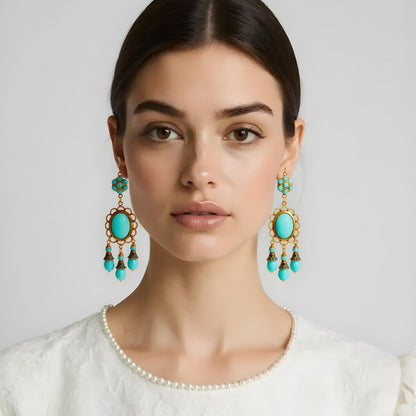 aros largos colgantes con piedra color turquesa