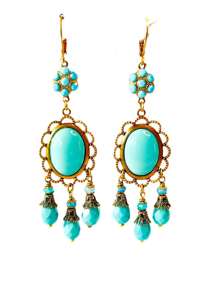 aros largos estilo chandelier con cristales facetados