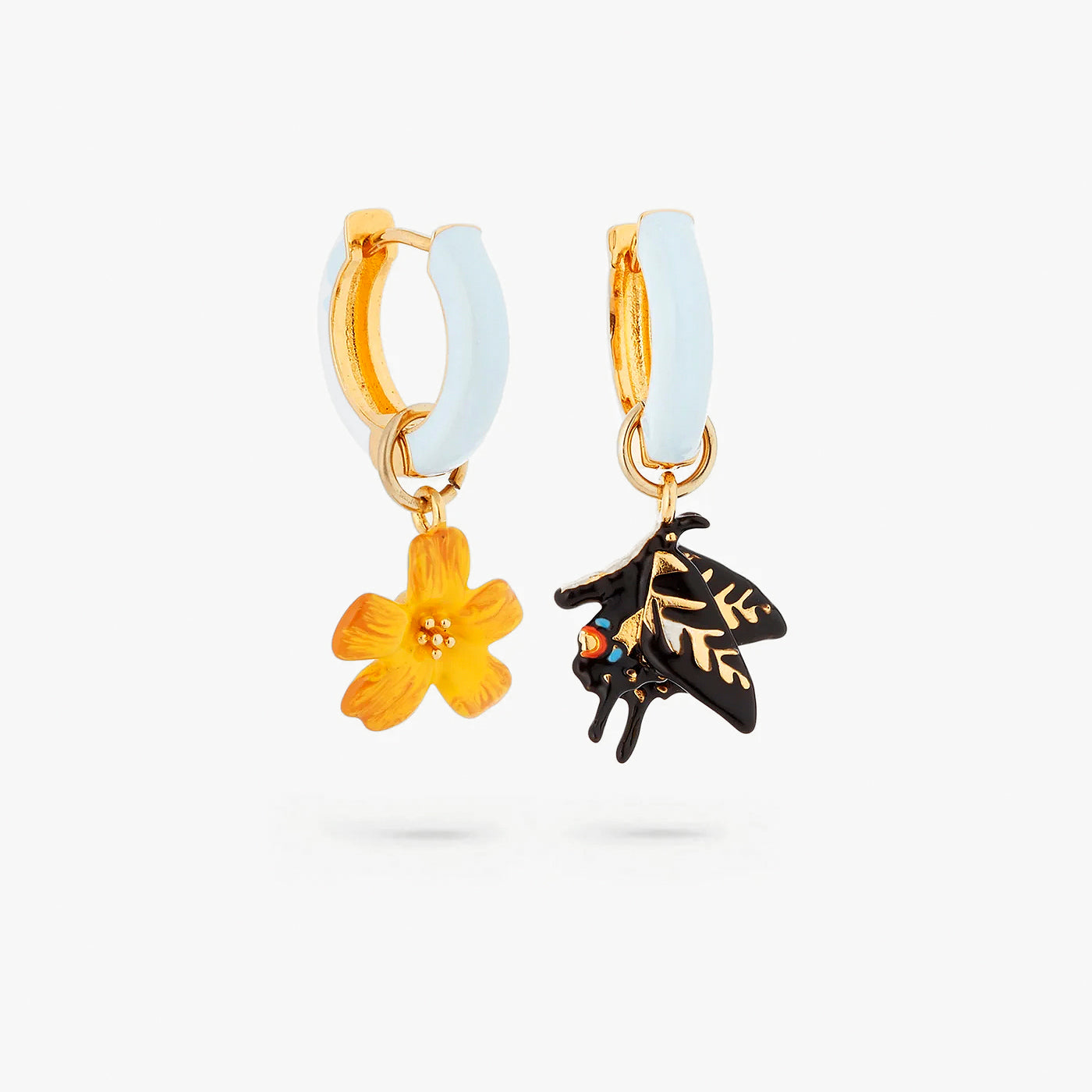 aros mariposa y flor amarilla