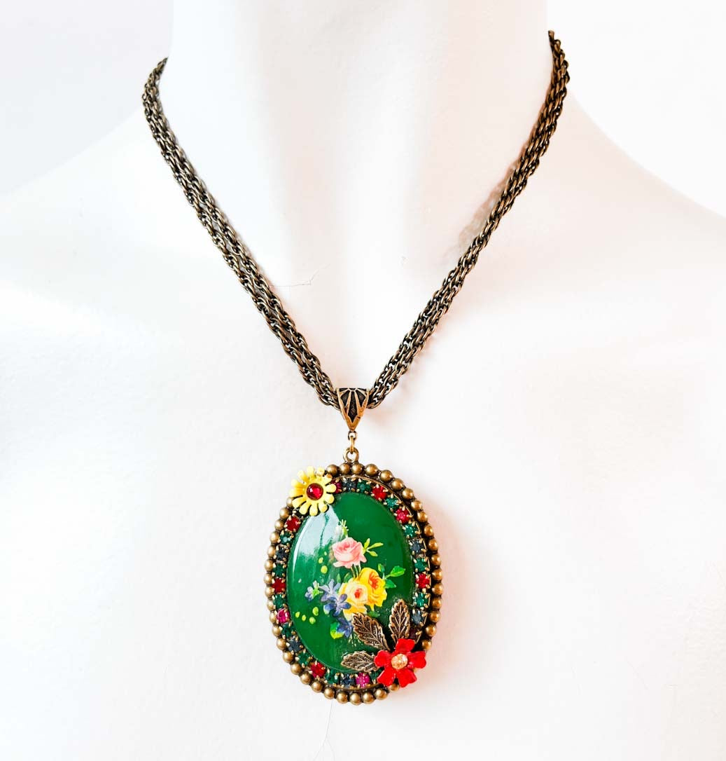 broche floral vintage verde ovalado