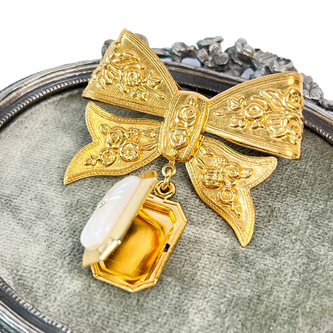 prendedor femenino dorado