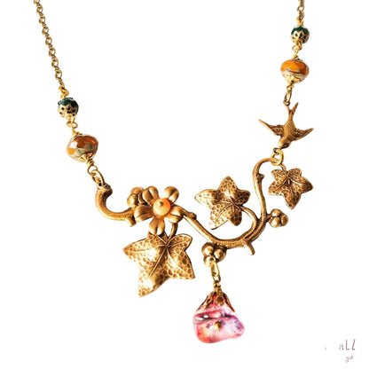 collar de rama en flor y golondrina diseño de joyeria vintage